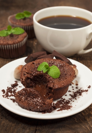 Chocolate cake with coffee, nuts and mintの写真素材