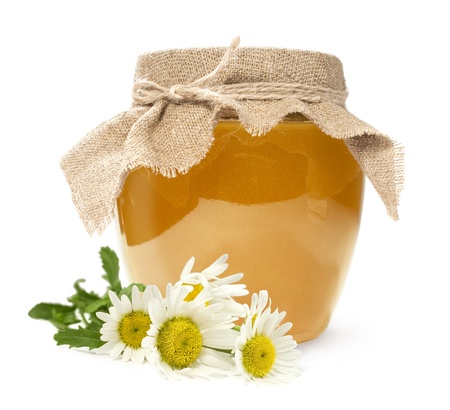 honey with daisies isolated on white
の写真素材