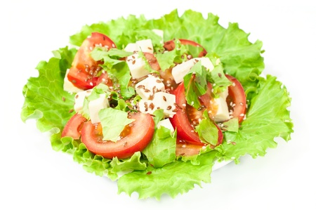 salad with fresh vegetables isolated on white
の写真素材