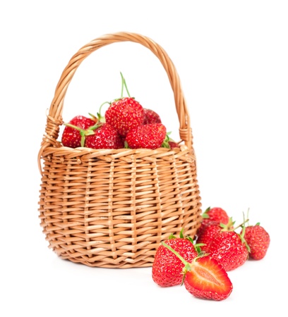 strawberry in wicker basket isolated on a white backgroundの写真素材