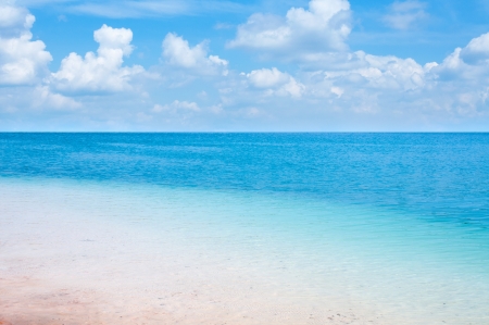 White sand beach clear blue sea with beautiful sky の写真素材
