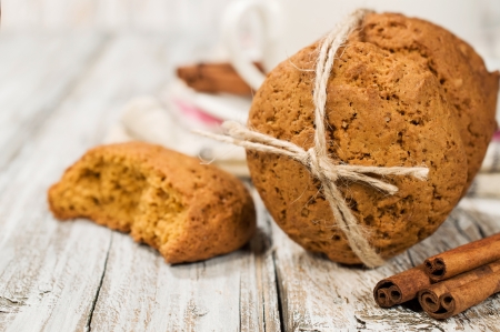 oatmeal cookies with cinnamon on wooden backgroundの写真素材
