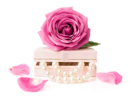 rose and pearls isolated on whiteの写真素材