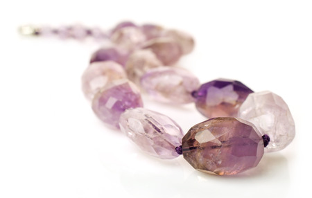 Ametrine necklace close-up isolated on whiteの写真素材