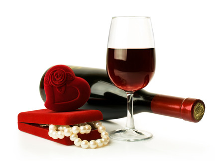 Red wine and pearl necklaceの写真素材