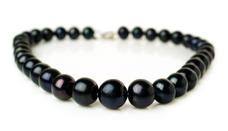 black pearl necklace isolated on whiteの写真素材
