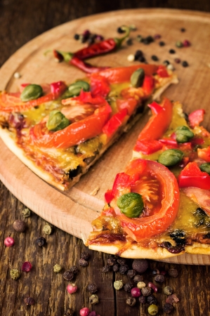 mushroom pizza with spices on a wooden の写真素材