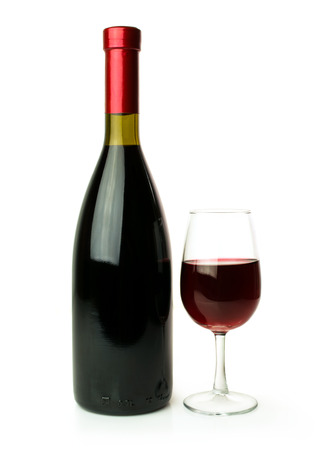 bottle and glass of red wine isolated on whiteの写真素材