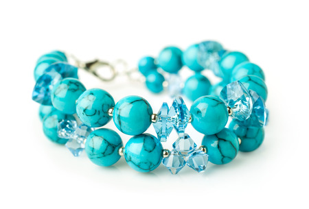turquoise bracelet isolated on whiteの写真素材
