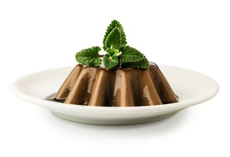 chocolate jelly dessert with mint  isolated on whiteの写真素材
