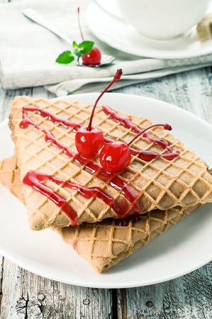 waffles with cherry topping closeupの写真素材