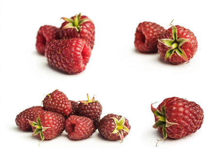 Collection of ripe red raspberries isolated on white backgroundの写真素材