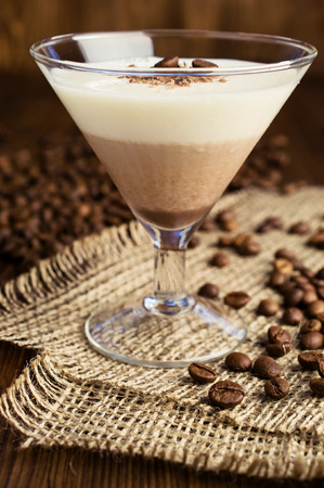 chocolate and vanilla panna cotta with coffee beansの写真素材