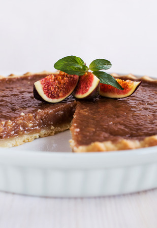 chocolate caramel tart with figs close-upの写真素材