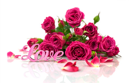 bouquet of roses and word "love" isolated on whiteの写真素材