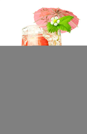 Strawberry cocktail with fresh berries and umbrella isolated on whiteの写真素材