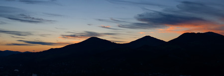 silhouette of a mountain range at sunset. Ukrainian Carpathiansの写真素材