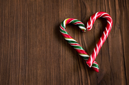Christmas candy on a wooden background
