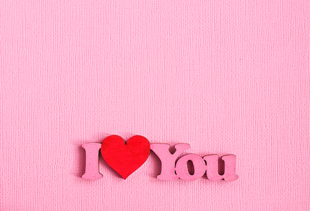 Pink paper background with words "I love You"の写真素材