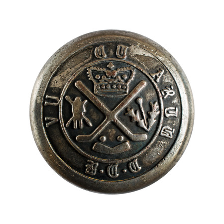 Antique silver buttons with the emblem of the military uniformの写真素材