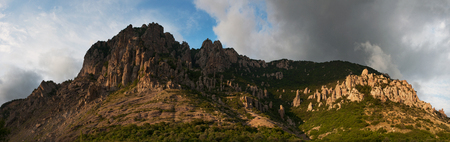 Panoramic landscape with a Demerdzhi mountain at sunsetの写真素材