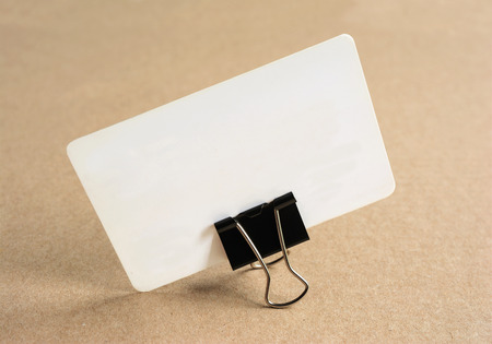 Blank business card for mockup on cardboard background.の写真素材