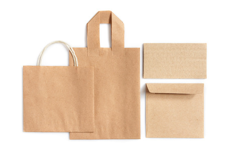 Mock up with craft bag and envelope isolated on white for design.の写真素材