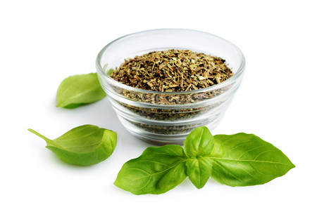 Dried and fresh basil isolated on white backgroundの写真素材