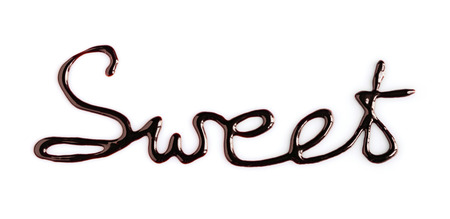 Word "Sweet" written by chocolate isolated on white backgroundの写真素材