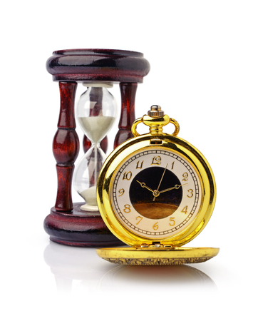 Vintage golden pocket watch and wooden hourglass isolated on white backgroundの写真素材