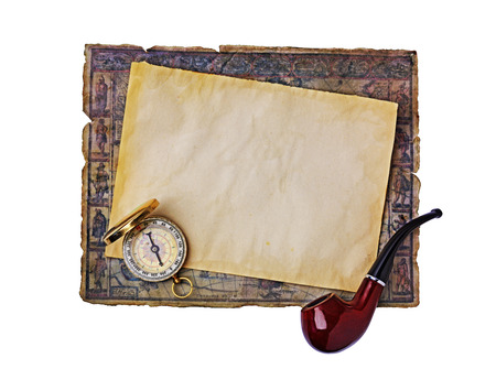 Nautical objects: ancient map, smoking pipe and compass isolated on white backgroundの写真素材