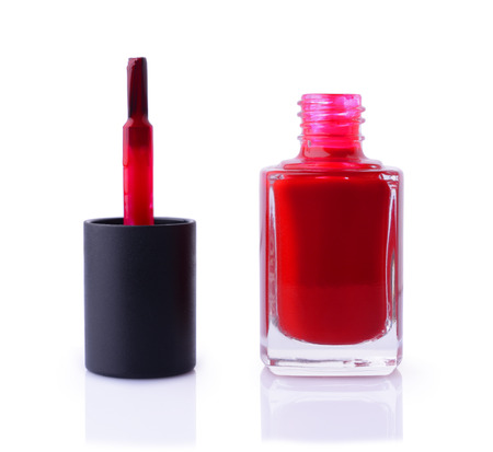 Red nail polish isolated on white backgroundの写真素材