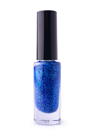 Blue shiny nail polish with glitter isolated on whiteの写真素材