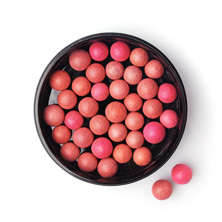 Pink and beige blush balls isolated on white backgroundの写真素材