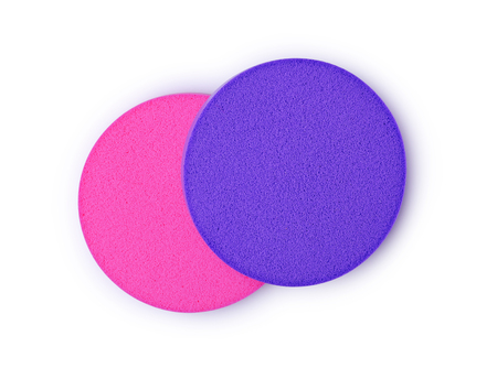 Pink and violet make up sponges isolated on white backgroundの写真素材
