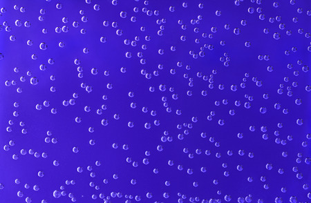 Abstract blue background with air bubbles in water