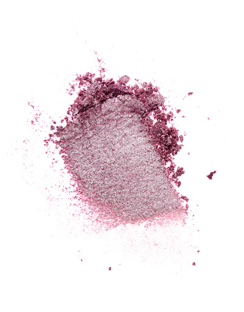 Smear of crushed violet eye shadow as sample of cosmetic product isolated on white backgroundの写真素材