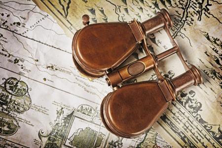Close-up view of a vintage binoculars on an old retro map. The map used for background is in Public domain. Map source: New York Public Library
の写真素材