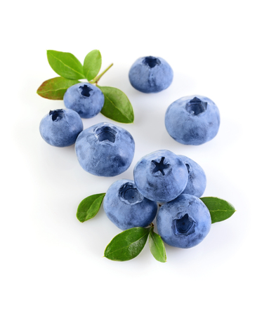 Healthy food. Close up view fresh ripe blueberry with leaves isolated on white backgroundの写真素材