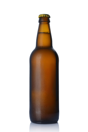 Single bottle of cold beer with drops isolated on white backgroundの写真素材