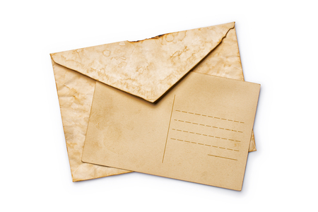Mockup of old vintage paper envelope and post cards isolated on white backgroundの写真素材