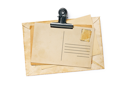 Mockup of old vintage paper envelopes and post cards with clip isolated on white backgroundの写真素材
