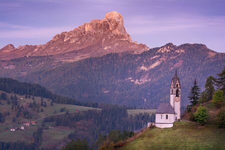 Picturesque landscape of morning in La Valle Wengen mountain village in Dolomites Alpsの写真素材