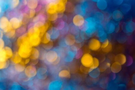 Defocused bright color lights on abstract bokeh backgroundの写真素材