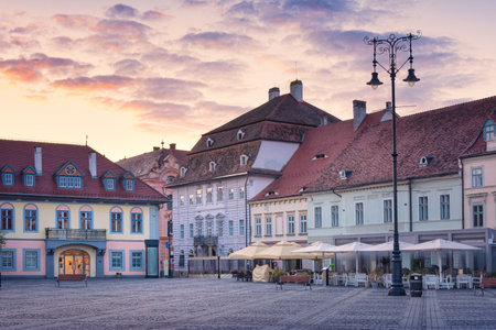 Cityscape with beautiful old buildings on Big Square (Piata Mare) in historical center of Sibiu town Transylvania, Romania, Europeの写真素材