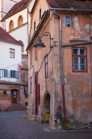 Sibiu, Transylvania, Romania - April 24, 2022: cityscape with beautiful old buildings in historical centerのeditorial素材