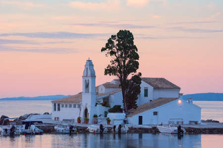 Beautiful landscape with Holy Monastery of Panagia Vlacherna of the coast Ionian Sea in the Corfu or Kerkyra is a Greek island, Europeの写真素材