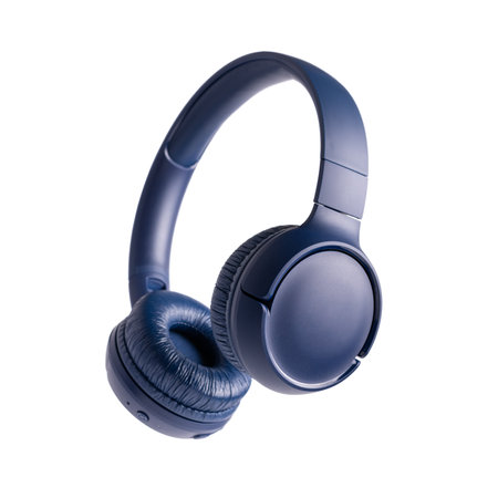 Close-up of black modern wireless headphones. Accessory for listening to music and relaxation isolated on white backgroundの写真素材