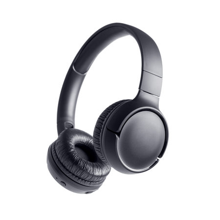 Close-up of black modern wireless headphones. Accessory for listening to music and relaxation isolated on white backgroundの写真素材