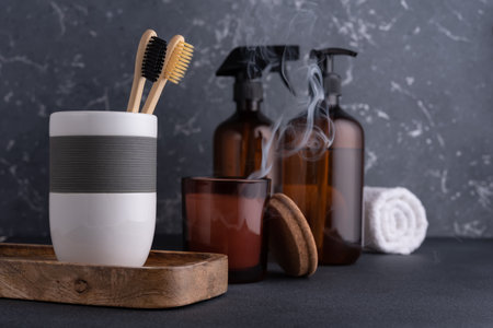 Bathroom composition with bamboo toothbrushes and recycled cosmetic bootles. Eco friendly bodycare concept.の写真素材